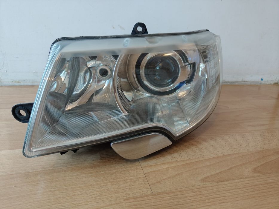 Skoda Superb 2 lampa lewa bi xenon skrętny kompletna