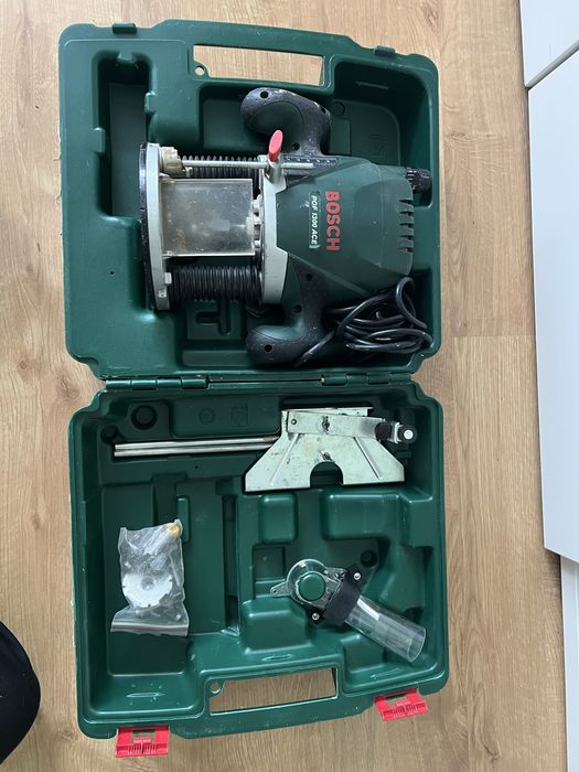 Frezarka górniwrzecionowa Bosch POF 1300 ACE + frezy