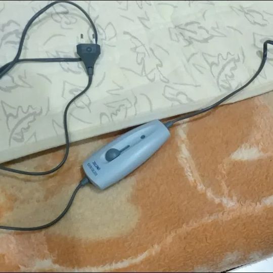 Colcha elétrica, com dois lados de aquecimento