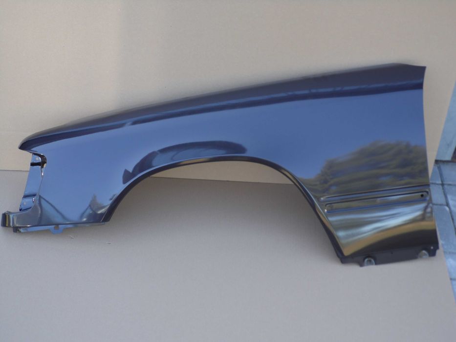 Mercedes E-Klasa W124 błotnik lewy brązowy 481