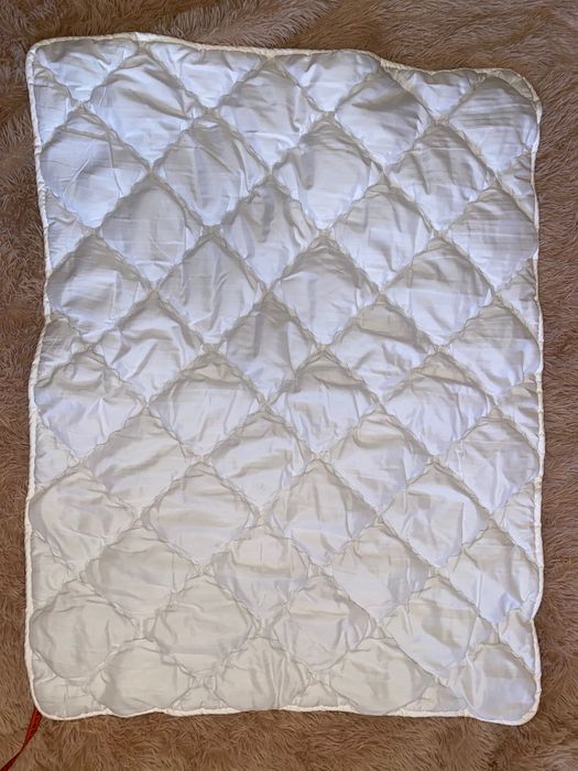 Подушка і ковдра для новонародженого в дитяче ліжко