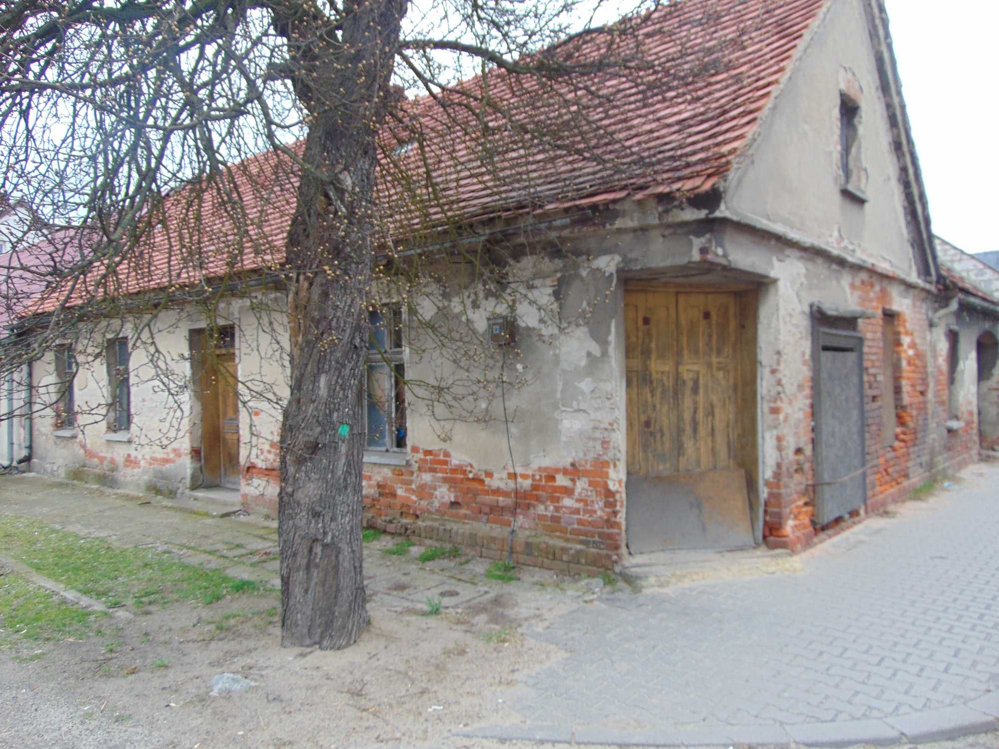 Atrakcyjnie zlokalizowana w centrum nieruchomość zabudowana