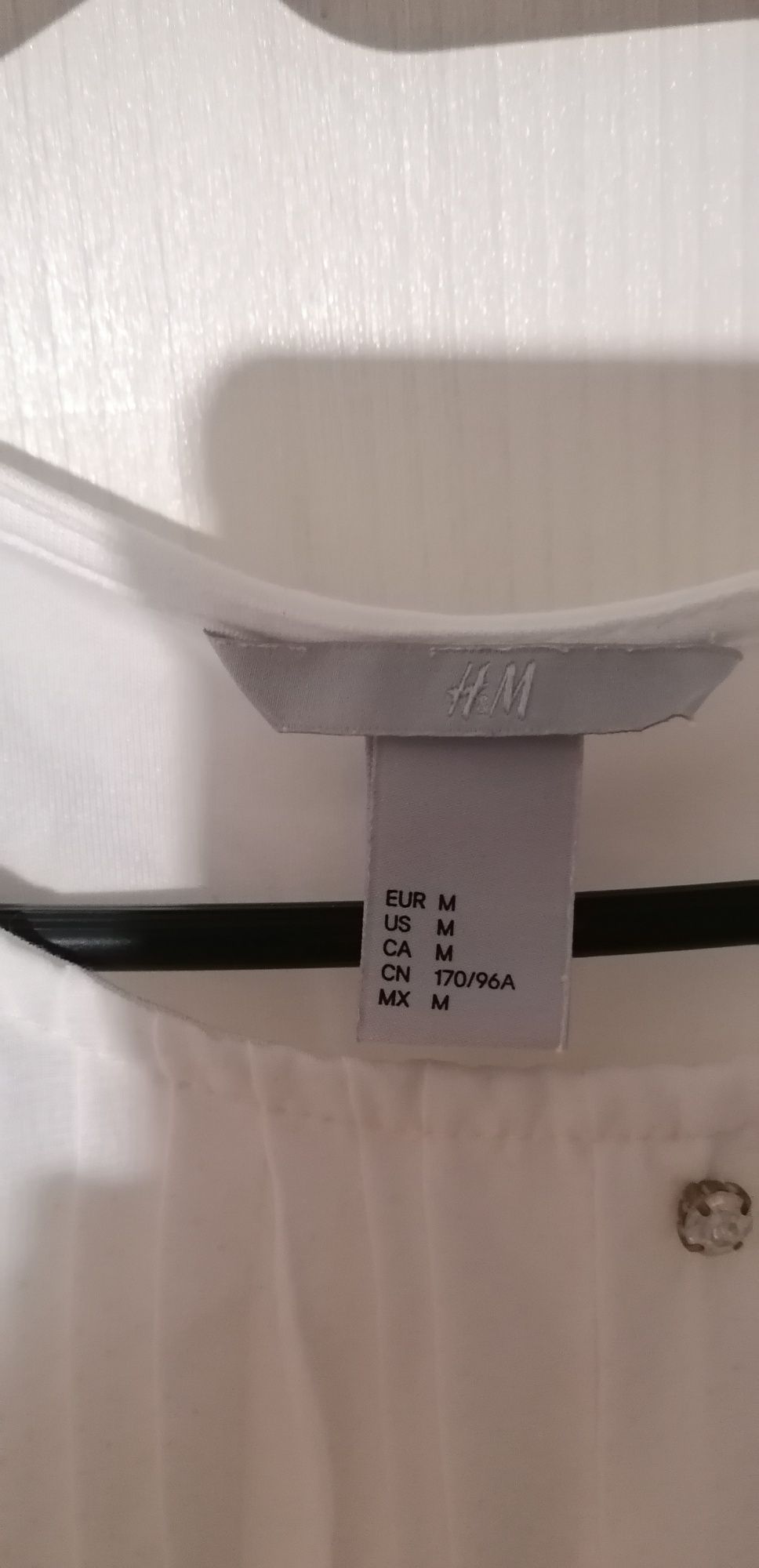Biała bluzka firmy H&M