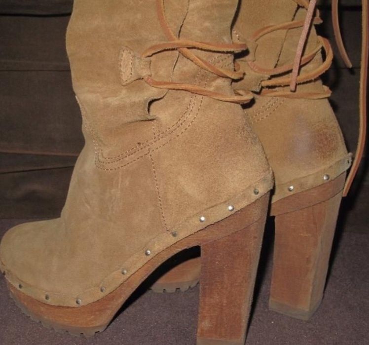 Botas Xuz quase novas, foram usadas muito poucas vezes.