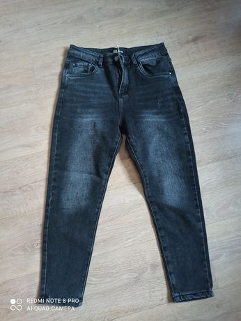 Nowe czarne jeansy M. Sara r. L