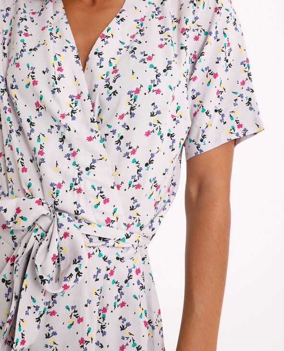 Kombinezon fioletowy w kwiaty r.32 Pimkie