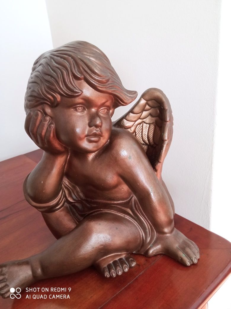 Anjo dourado marfinite