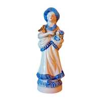 Porcelanowa figurka - dziewczyna z bukietem i ptaszkiem.