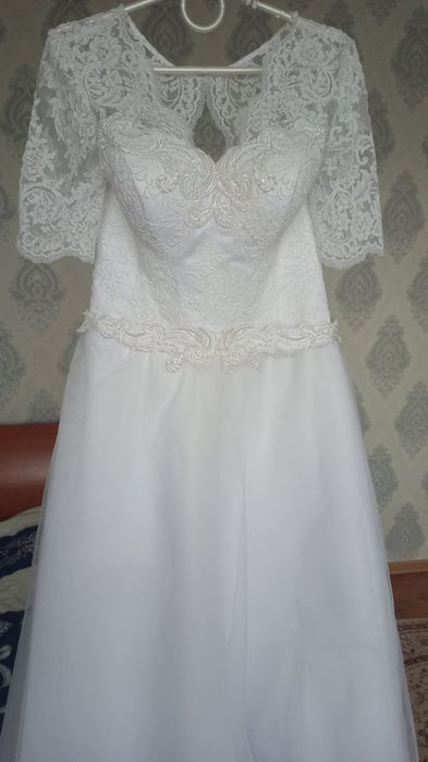 Нові 50 розміру весільні сукні