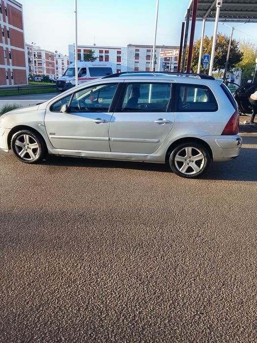 Vendo ou troco Peugeot 7 lugares 04