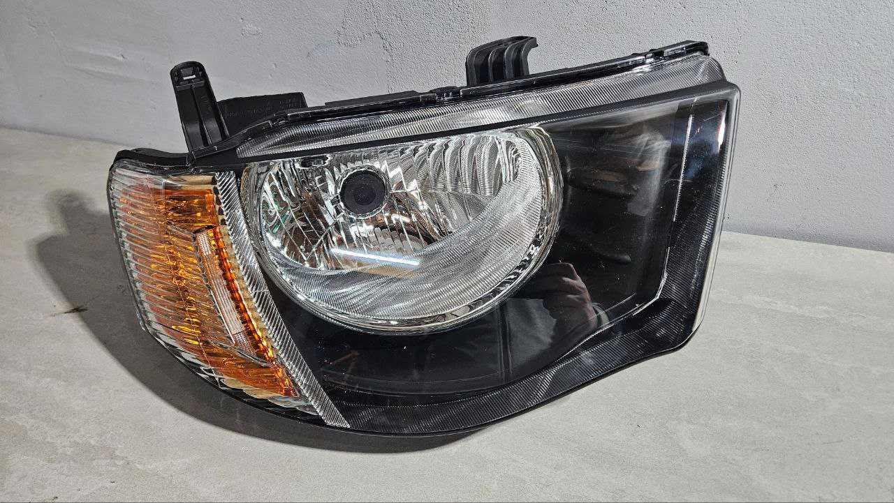 Фара передня Mitsubishi L200