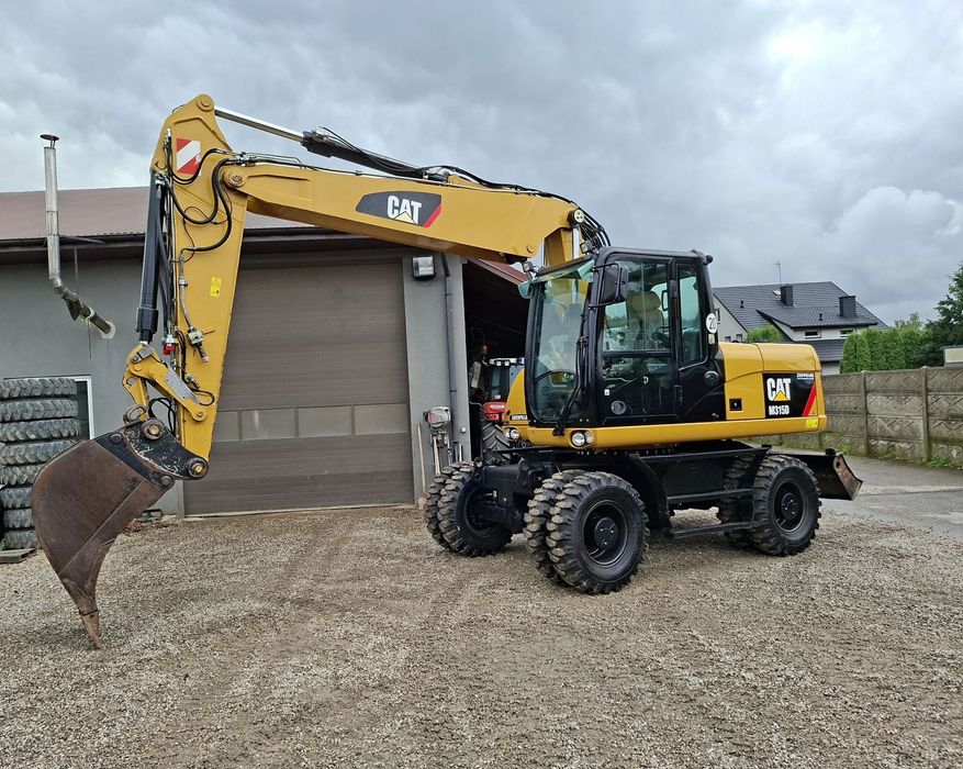 Caterpillar CAT M 315D  koparka kołowa CAT z Niemiec 8100 godzin, bez AdBlue, bez DPF