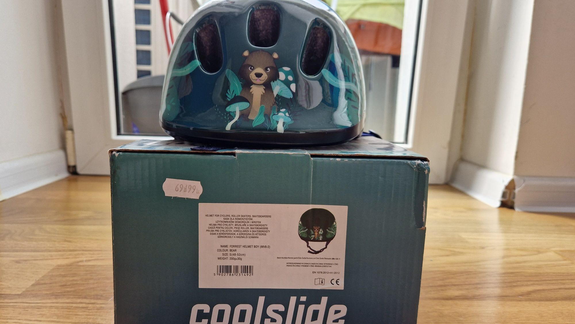 Zielony kask dla dziecka Coolslide jak nowy S 48-52