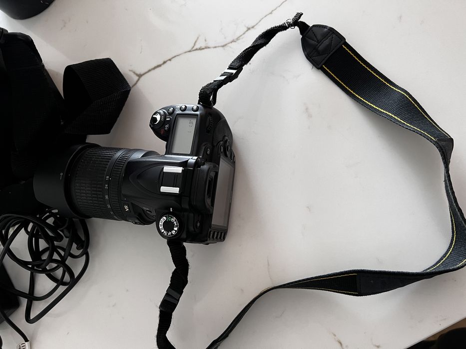 Nikon D90 + 18-105 mm