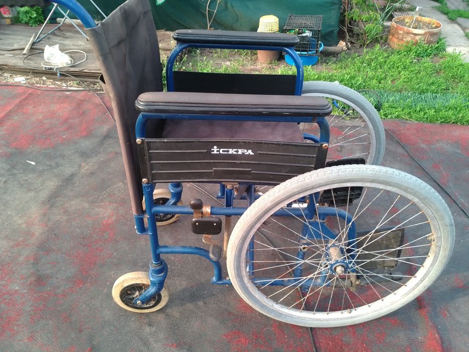 Инвалидная коляска искра.