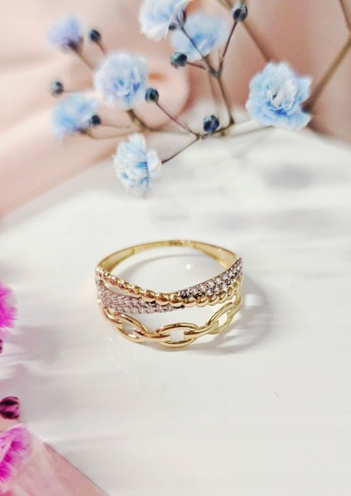 Złoty pierścionek, szeroki, cyrkonie, zawijany, kulki, pr 585 r. 19