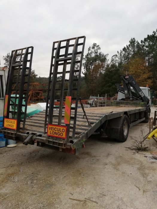 Camiao porta maquinas