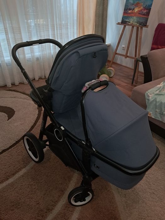 Коляска для погодок