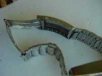 Bracelete de relógio, metálica.