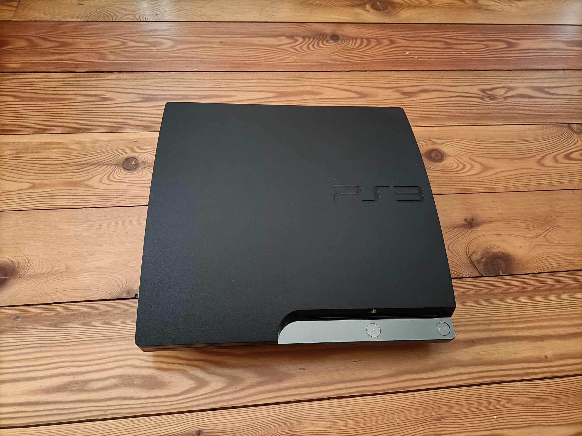 PlayStation 3 slim e acessórios.