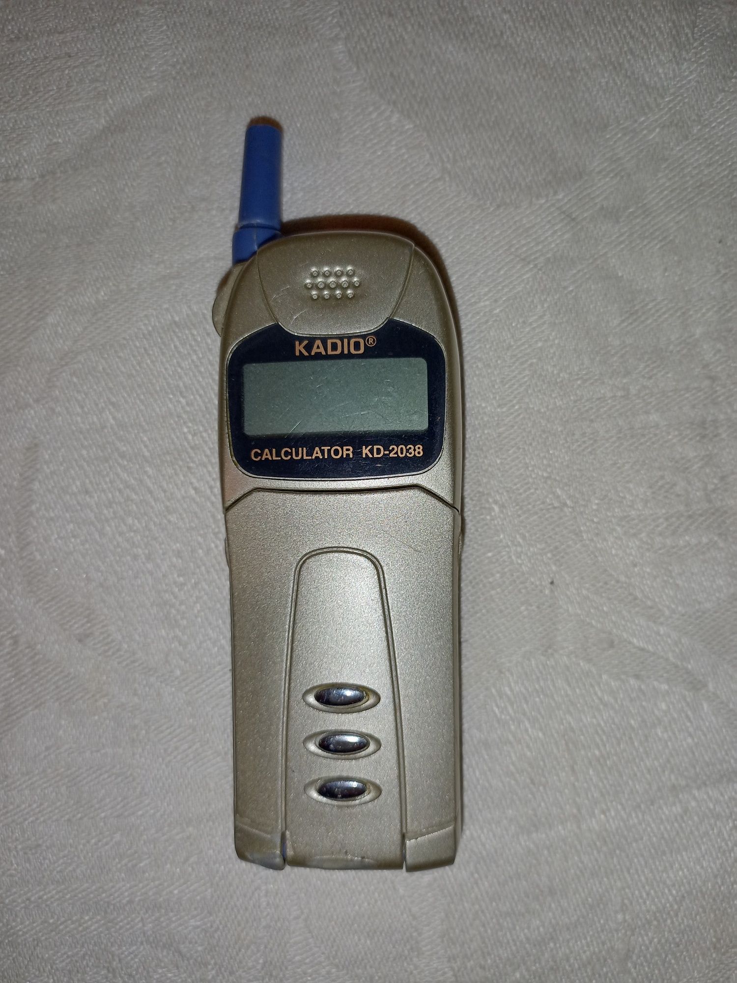 Калькулятор 90х в виде мобильного телефона