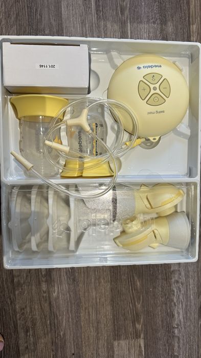 Подвійний молоковідсмоктувач