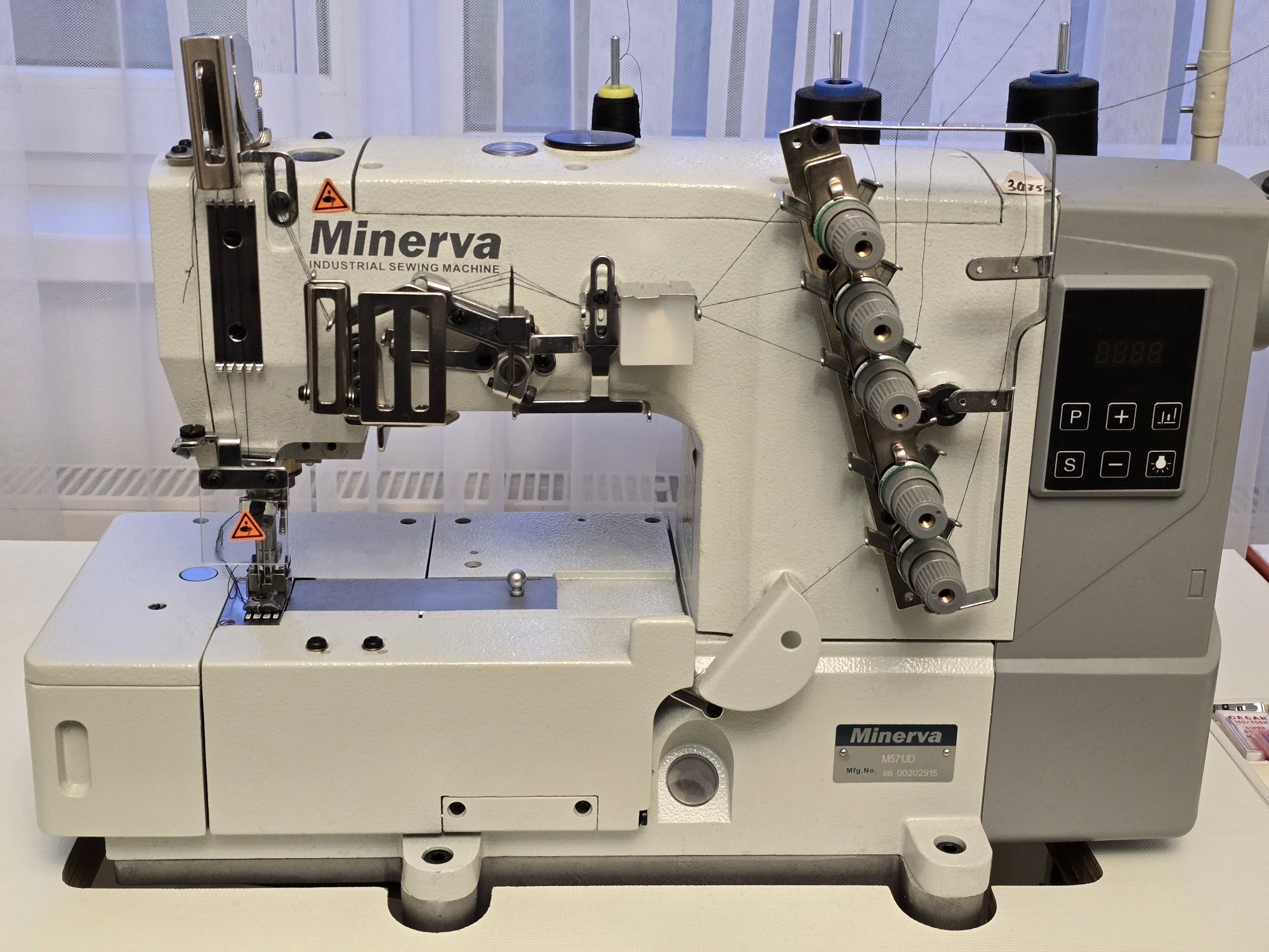 Minerva M571JD промислова розпошивальна машина з економічним вбудовани