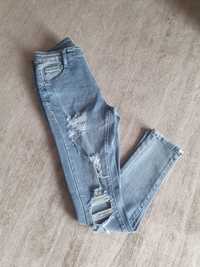 Spodnie jeansowe Laulia z przetarciami i dziurami r.38