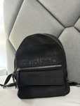 mochila pequena desigual