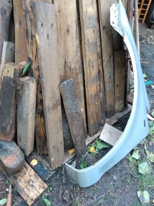 Błotnik przedni lewy Corsa D