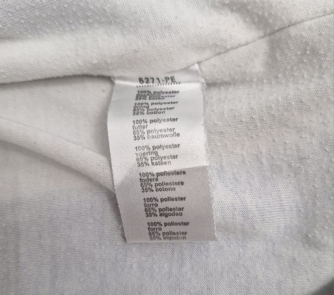 Wiatrówka lacoste z zasuwanymi kieszeniami oraz sciągaczem
