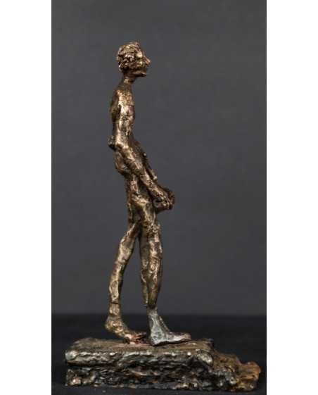 Nagi wędrowiec. Brąz. Żeliwo. XX wiek.