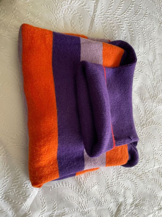 Camisolas e porta moedas