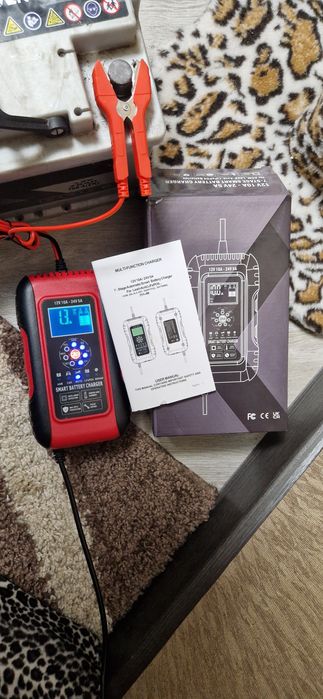 Автоматическое импульсное зарядное устройство новое на авто,мото и др