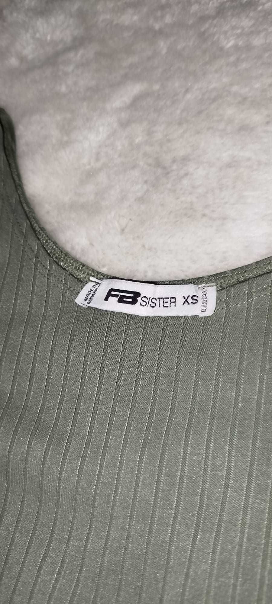 Top com detalhe nos braços New Yorker XS