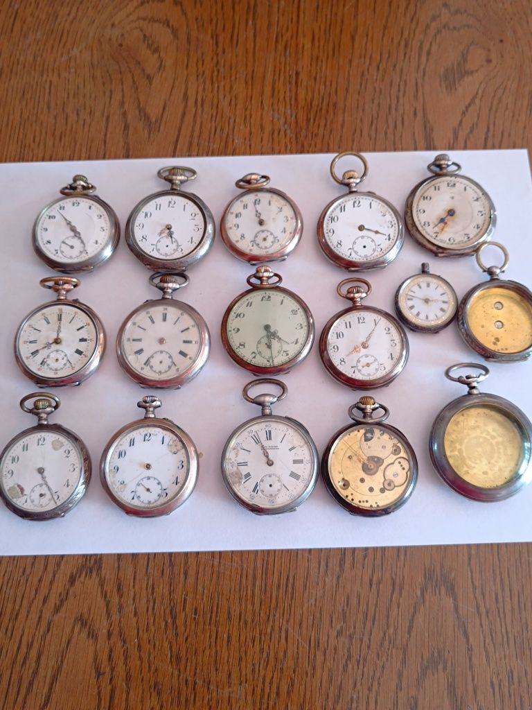 14 srebrnych zegarków kieszonkowy i 2 koperty