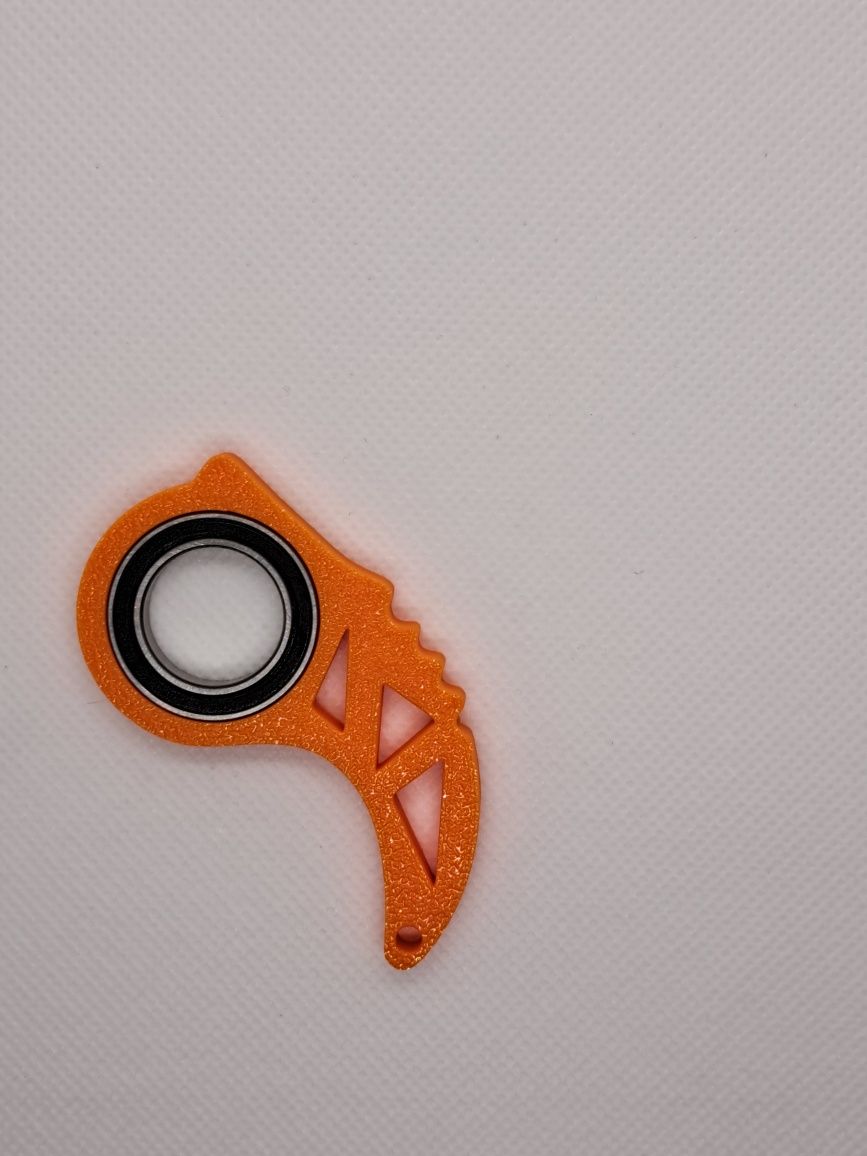 Keyrambit fidget spinner Flexi Dino TikTok 100% wypełnienia