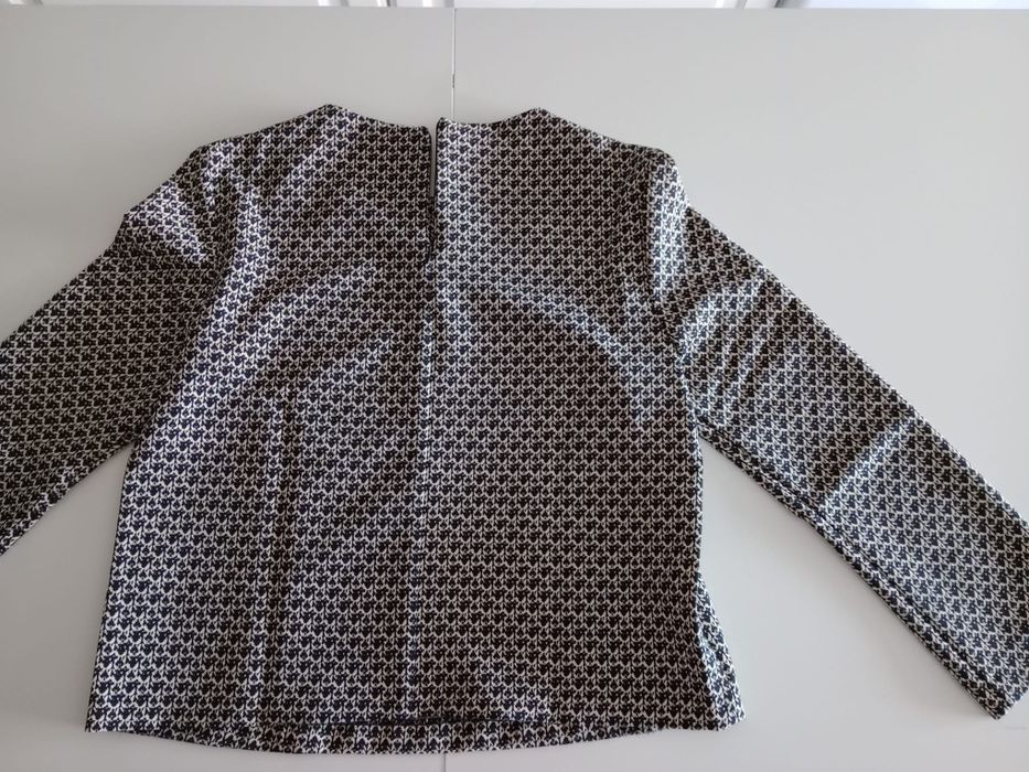 Conjunto camisola e calça.