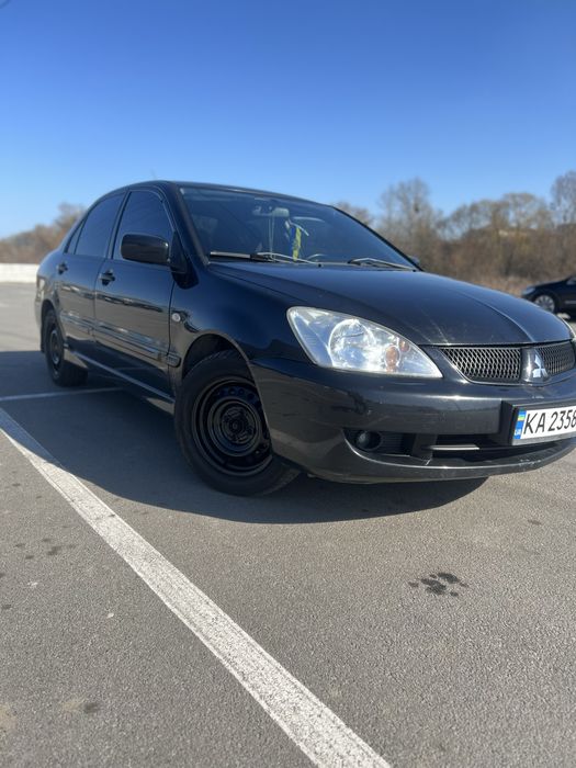 Mitsubishi ланер 9