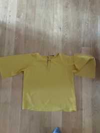 blusa amarela com mangas "cortadas"