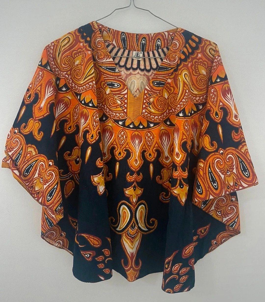 Blusa estilo poncho