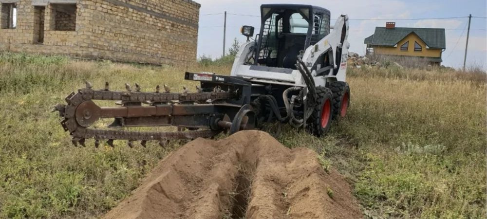 Аренда. Услуги мини-погрузчика Bobcat, ковш,бур,траншеекопатель,вил