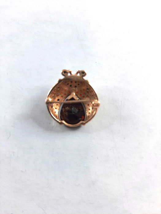 Złota broszka z kamieniem 3,87GR 585PR