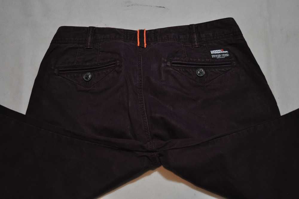 SUPERDRY MILITARY S 82cm 30/30 męskie spodnie jeansowe slim fit s7v