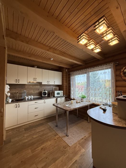 Продаж деревʼяного будинку