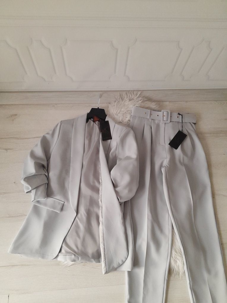 Szary elegancki garnitur marynarka + spodnie w kant M