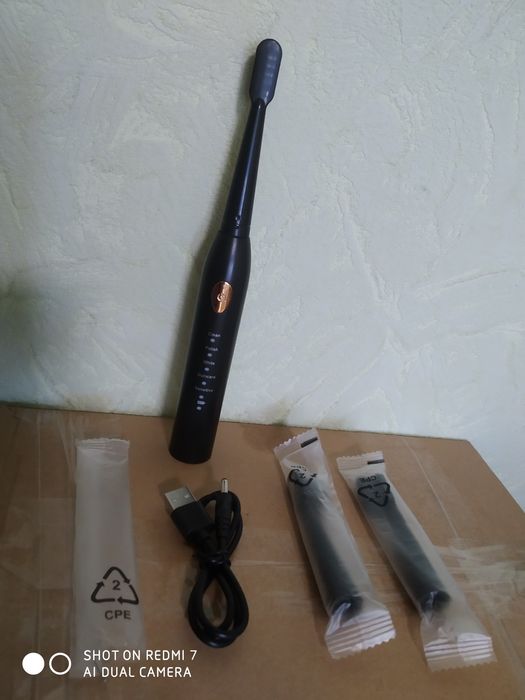 Єлектрична зубна щітка