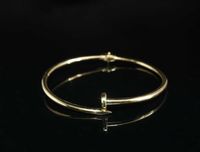 Złoto- 585 złota damska bransoletka bangle, gwóźdź.