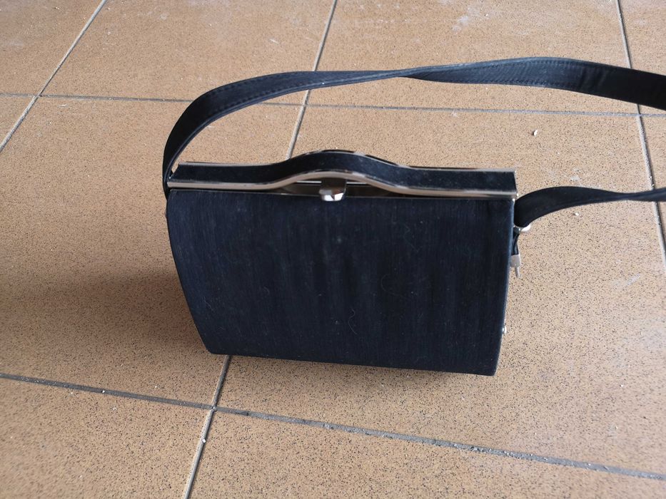 Mala de mão e a tiracolo