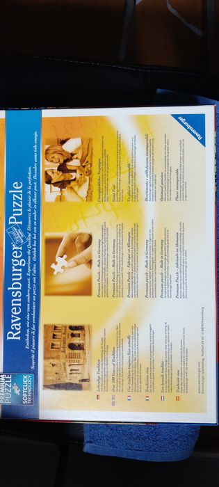 Puzzle Ravensburger 1000 peças "The Bizarre Bookshop"